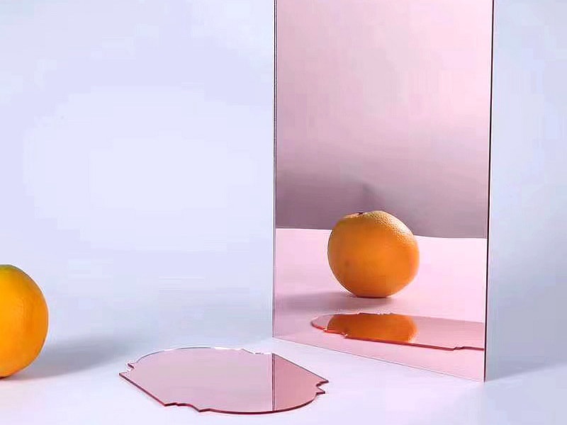 Espejo de plexiglás rosa
